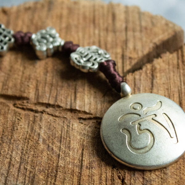 Amulet tybetański Om Zawieszka
